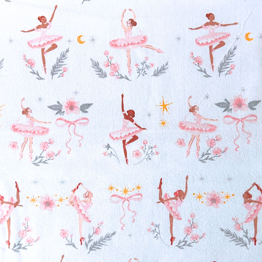 Close-up of ballerina and floral pattern fabric used in Hume’s teen cloth pads. Soft, dreamy design for young users.