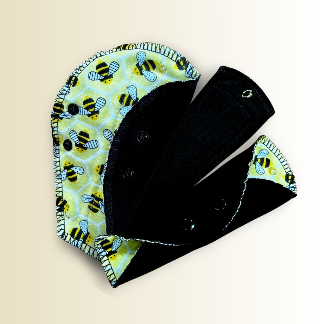 Set of three bee print thong liners for light flow, discharge, or spotting