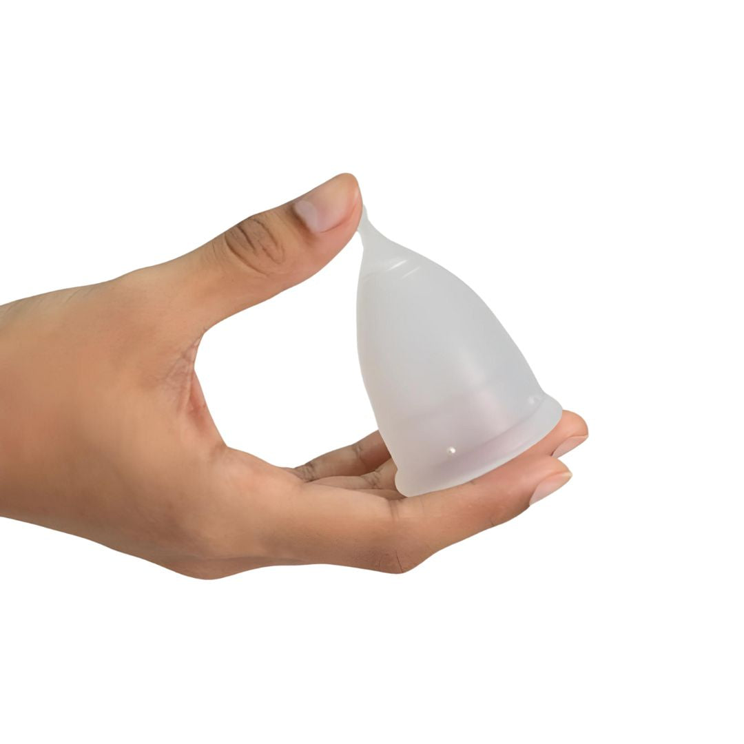 Hume’s menstrual cup size 1 held in hand against white background