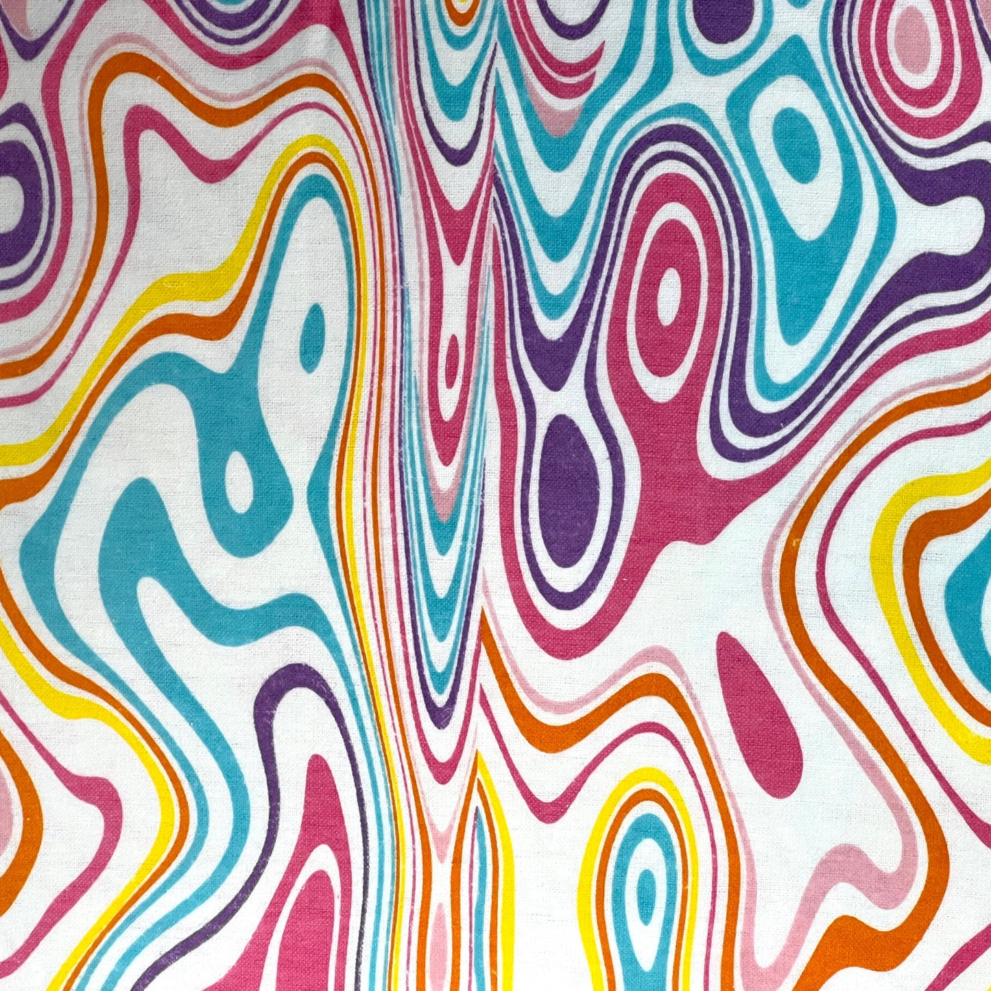 Close-up of pink swirl cotton fabric used for reusable interlabial pads