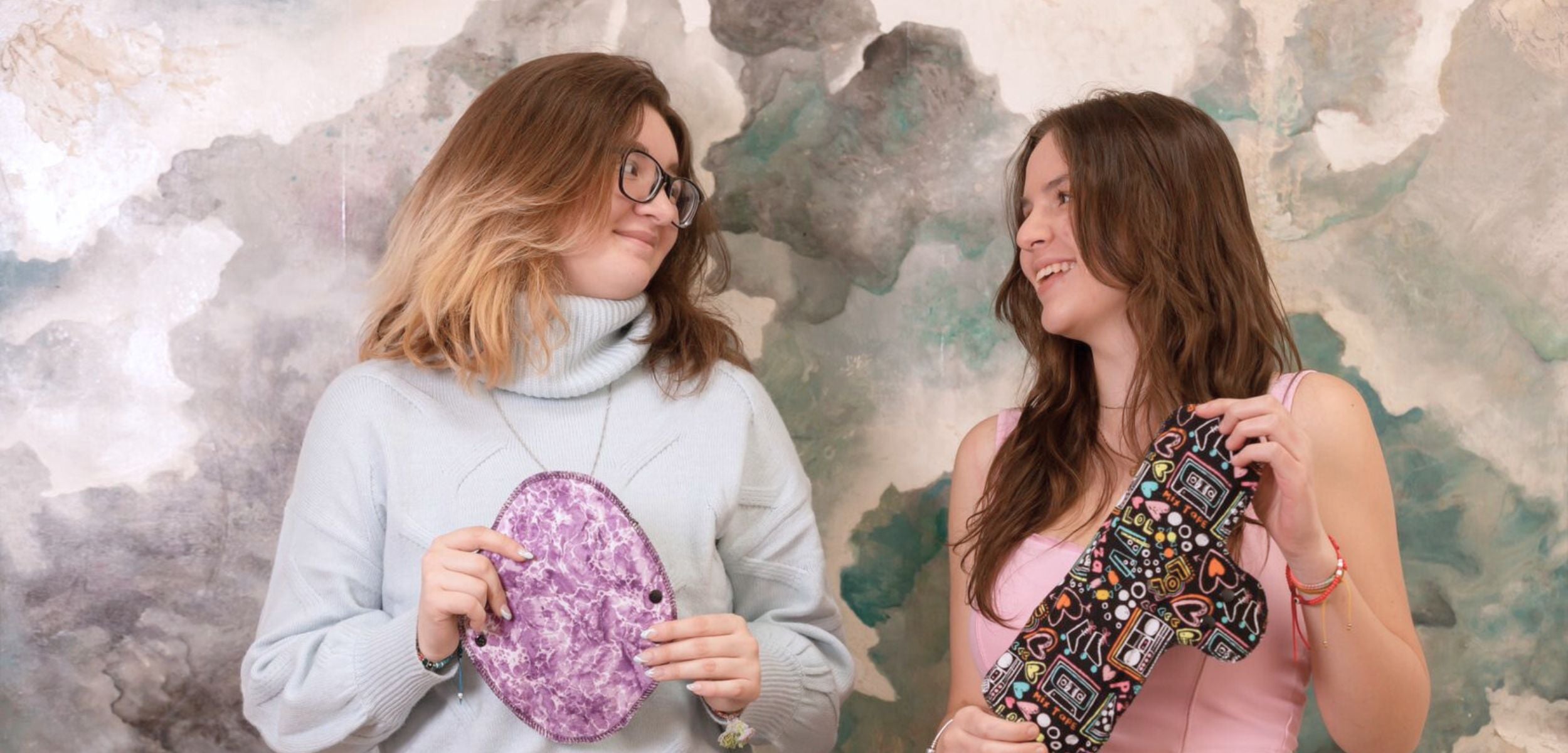 Group of diverse women smiling and holding menstrual pads – Hume’s Period Care eco-friendly banner