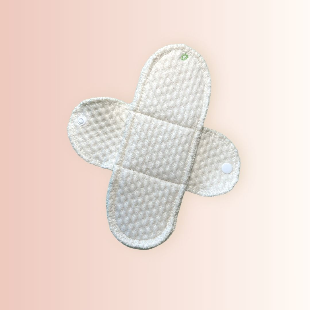 Top view of organic cotton reusable pad showing absorbent side – no PUL layer