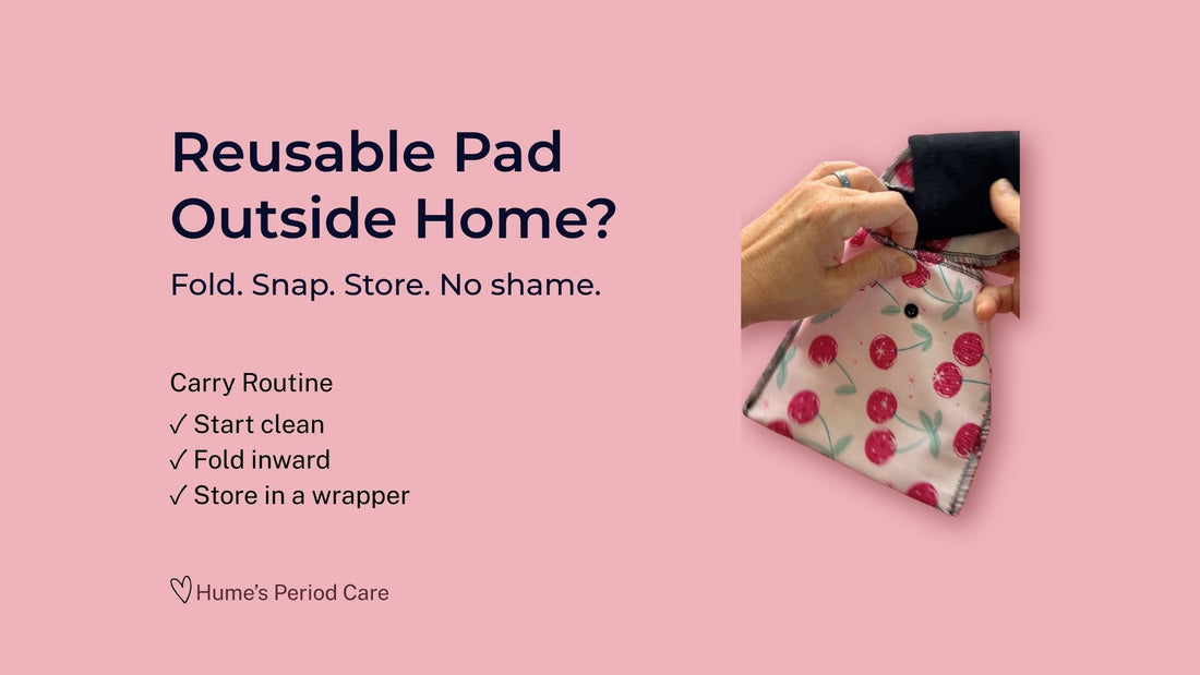 Reusable pad being placed into a cherry print wrapper for carrying reusable period care outside home.