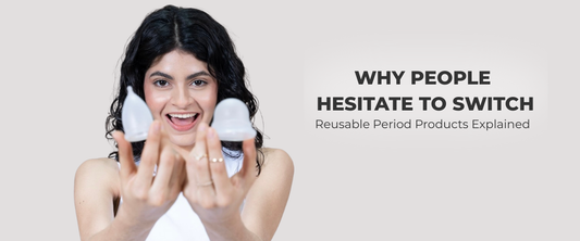 Smiling woman holding a menstrual cup and disc – reusable period care products blog cover