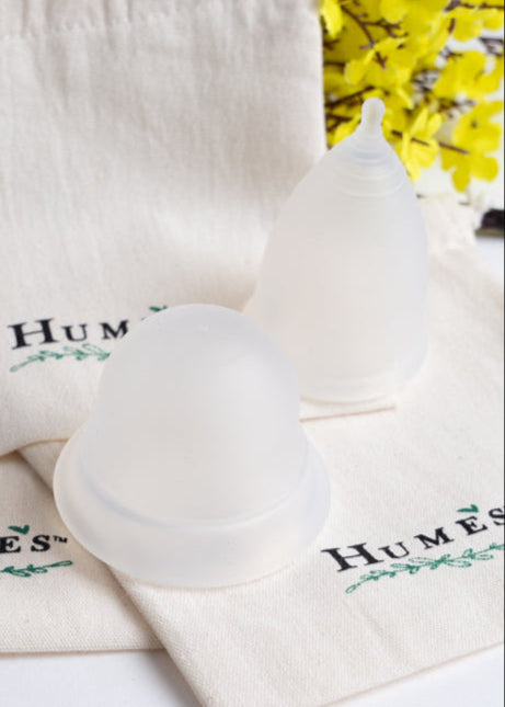 Clear Hume’s menstrual cups with cotton storage pouches