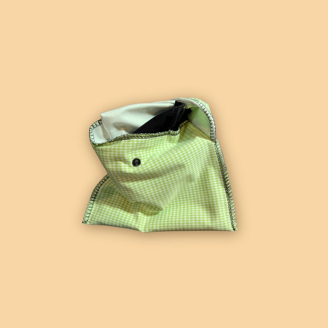 Open green gingham pad pouch with white lining