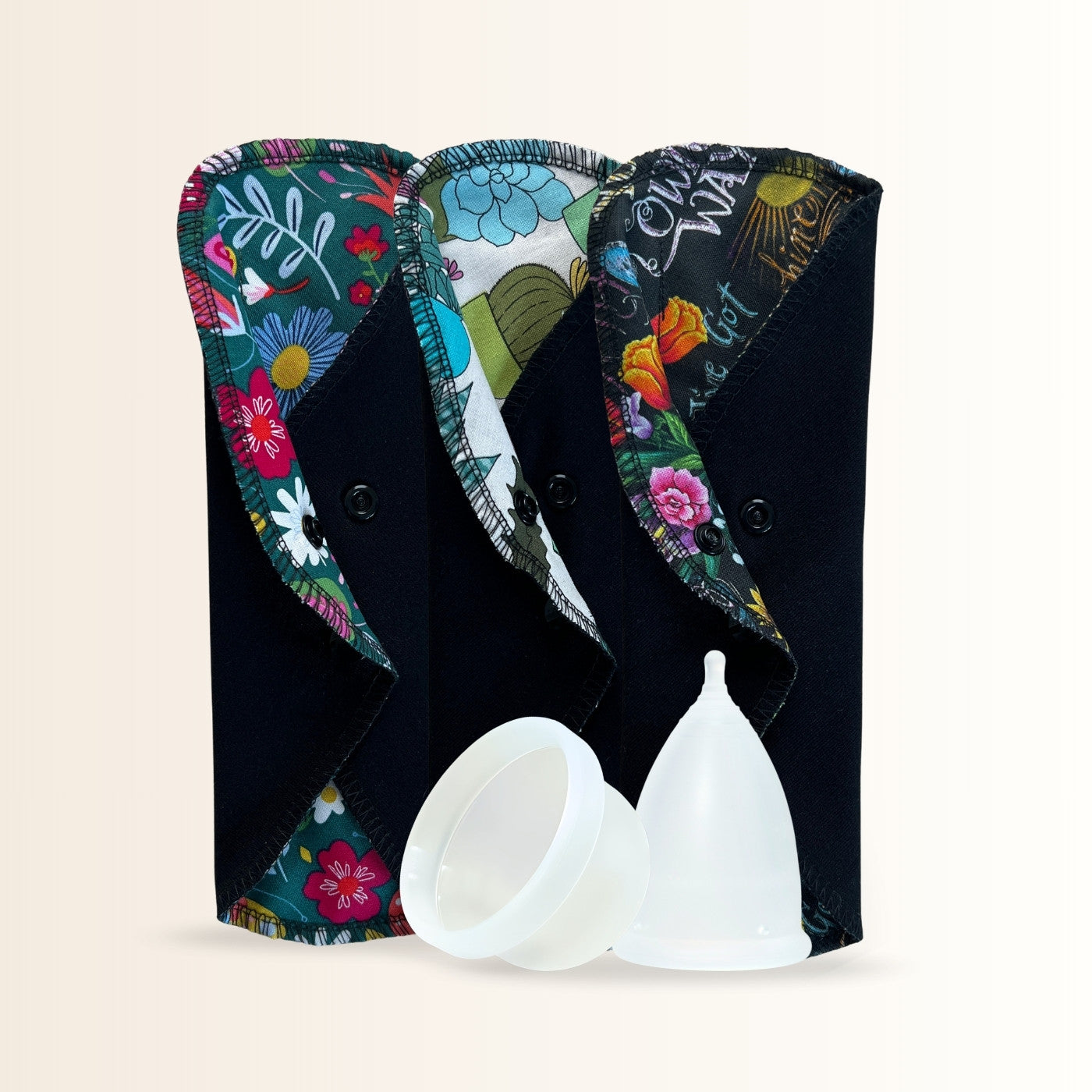 New reusable period pad prints with menstrual cup and disc from Hume’s Period Care