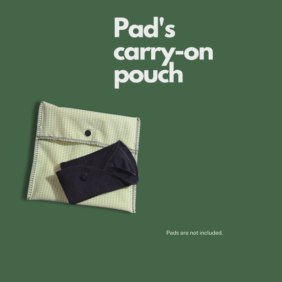 Green gingham reusable pad wet bag video showing pouch use with folded cloth pad